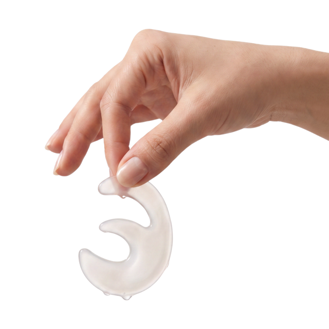 Colette Deep Collagen eye mask draped over a hand